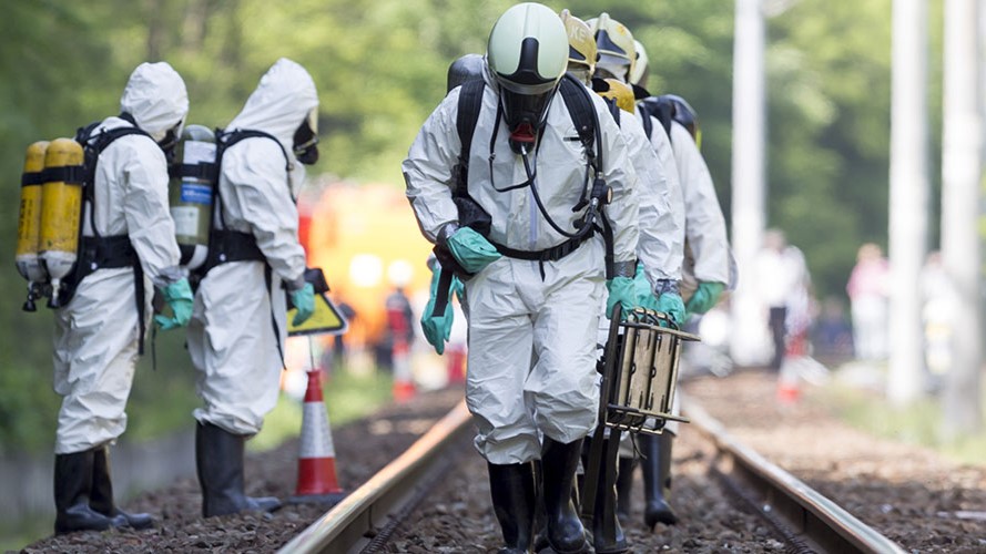 A team in protective suits
